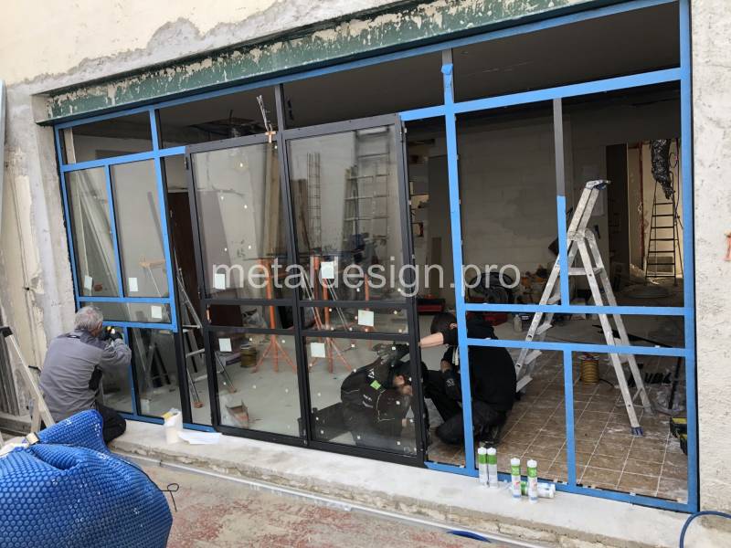 Rénovation de façade en baie vitrée en acier