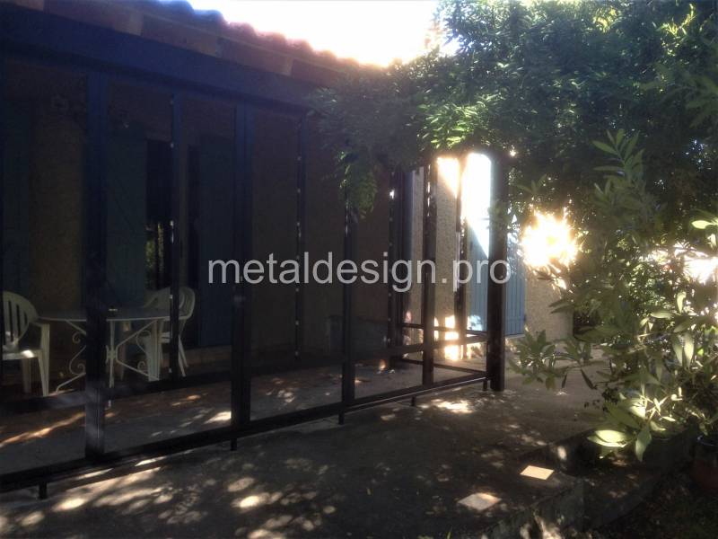 Transformation d'une terrasse en pièce à vivre en posant une véranda proche de Salon-de-Provence