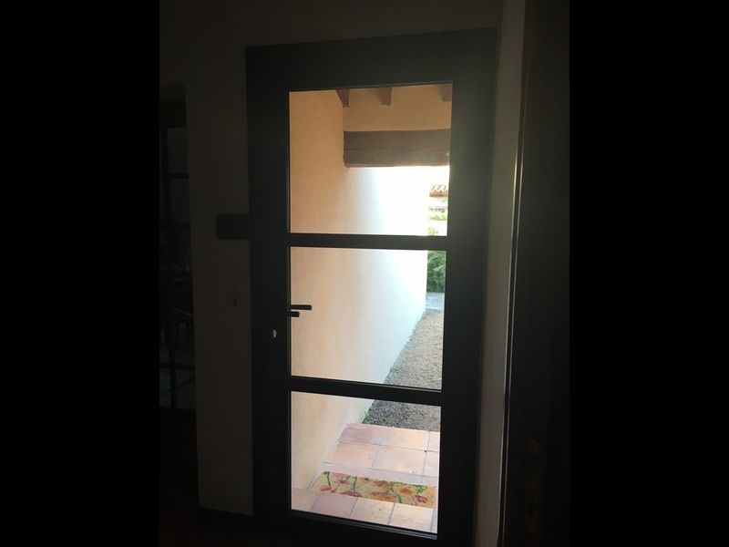 Porte d'entrée avec traverses horizontales à éguilles 13