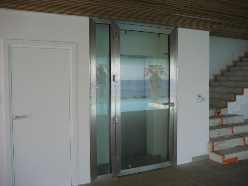 fabrication et Installation de porte inox à sausset les pins